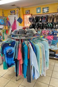 interior gift shop of Pelican Nest on Dauphin Island, Alabama with t-shirts, hats, ice cream